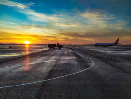 Fuel tanker on airstrip. Empty runway, airstrip in the airport. Travel concept
