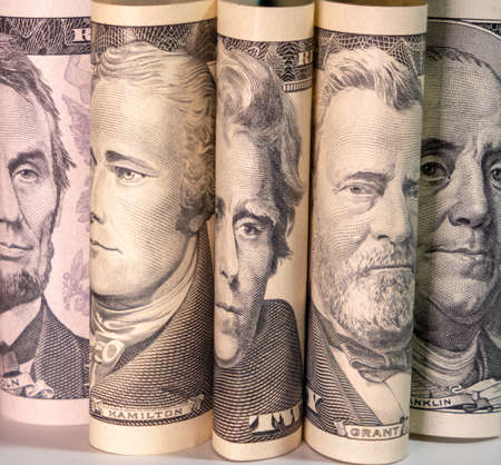 Portraits of presidents on dollars. US dollars background.