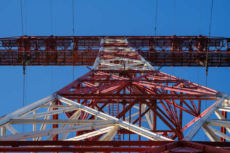 high voltage tower below. concept of high voltage construction. high voltage pylon