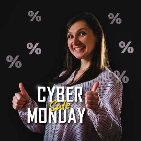 Cyber monday with young positive cheerful satisfied cute rejoice good-looking girl advise choice. Cyber Monday text smiling woman showing thumbs upの写真素材