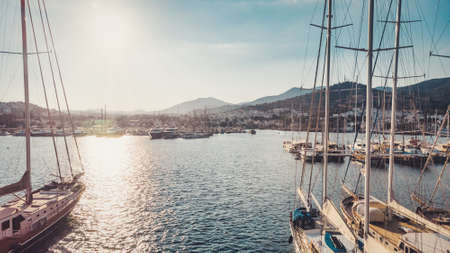 Marina harbor with beautiful white yachts with mountains. Greece.の写真素材