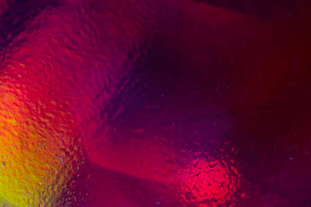 Abstract red background with bubbles. Glossy wet surface. Abstract desing background