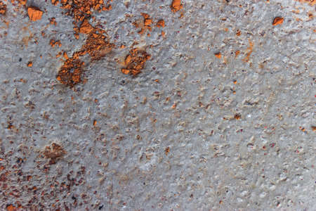 concrete surface with a crumb of a broken brick.