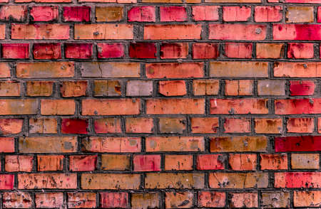 Background color brick, made on the basis of the wall of rough masonry (brickwork).