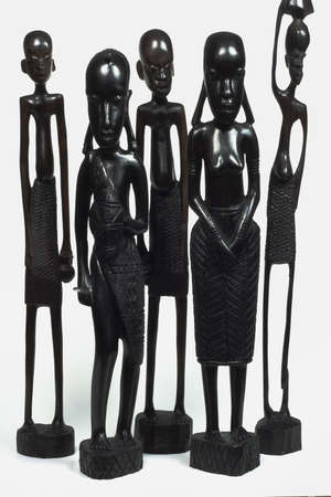 African woodcarvings depicting a familyの写真素材