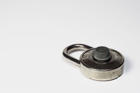 An old style silver combination padlockの写真素材