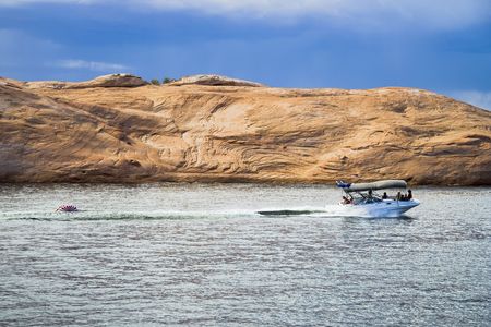 Boating on Lake Powell in Glen Canyon National Recreation Area Utahの写真素材
