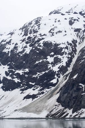 Shot of an avalanche area on a mountain in Glacier Bay National Park Alaskaの写真素材