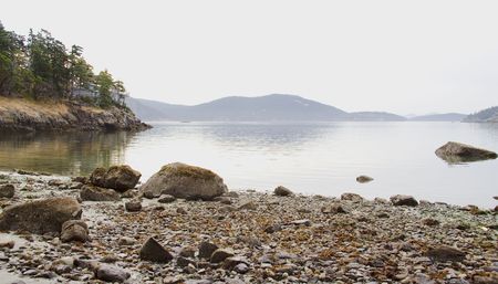 Rock covered beach of Lopez Island in the San Juan Islands of Washingtonの写真素材