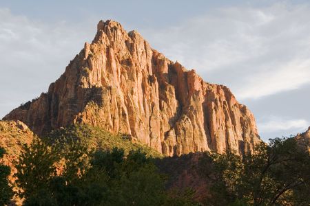 Watchman rock formation formed by water erosion formed by the Virgin River n Zion National Park Utahの写真素材