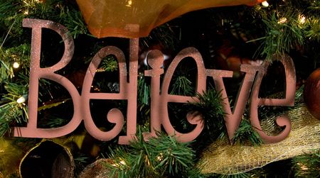 Beautiful and colorful holiday ornament decoration hanging on Christmas treeの写真素材