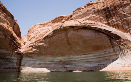 Beautiful rock arch formation at Lake Powell in Glen Canyon National Recreation Area, Utahの写真素材