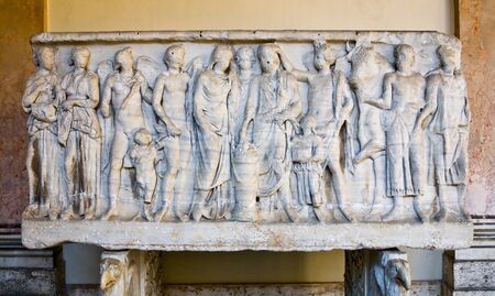 Ancient Sarcophagus with detailed carvings of people located in the Vatican City Museumの写真素材