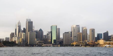 Buildings in Sydney, Australia business district skyline taken from Sydney Harborの写真素材