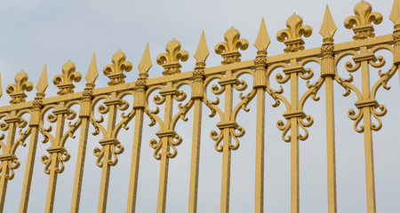 Gold gate at the palace of Versailles in Paris, France.の写真素材