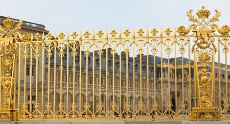 Gold gate at the palace of Versailles in Paris, France.の写真素材