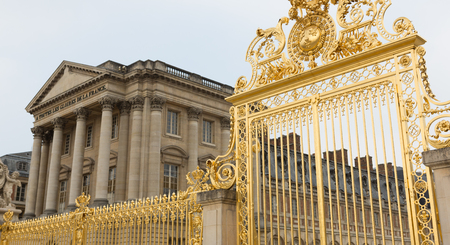 Gold gate at the palace of Versailles in Paris, France.のeditorial素材