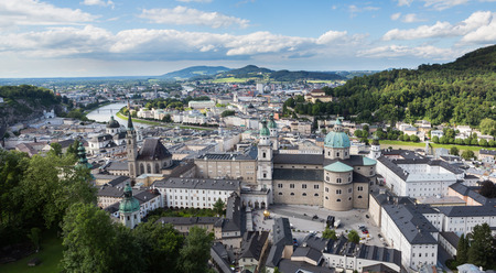 Looking down to the city of Salzburg Austria at sunset from  Hohensalzburg Castleの写真素材