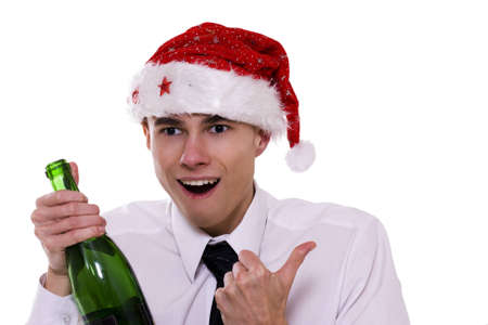 Man with a bottle of champagne on the new year partyの写真素材