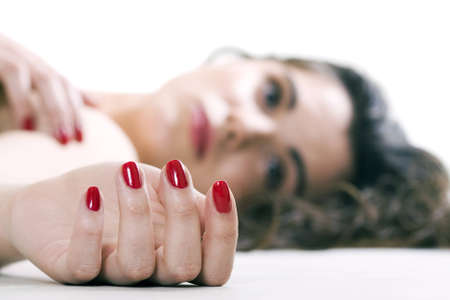 lying girl. studio survey with make-upの写真素材