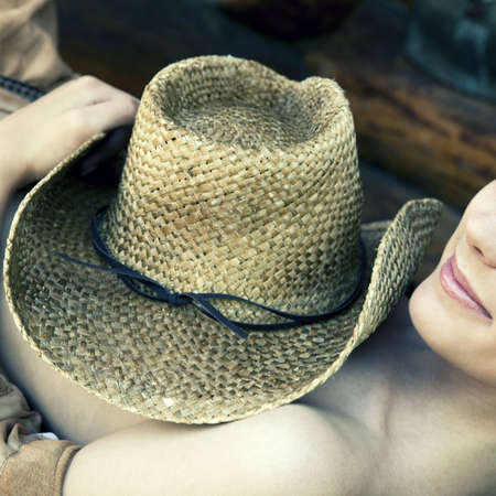 cowboy hat and pretty girl's lipsの写真素材
