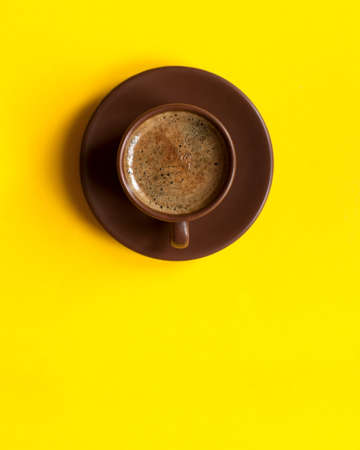 Coffee espresso cup. Yellow copy space tableの写真素材