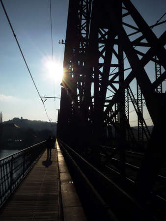 Walking through the Prague's rail bridgeの写真素材