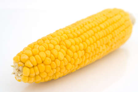 Yellow cob corn isolated over white background