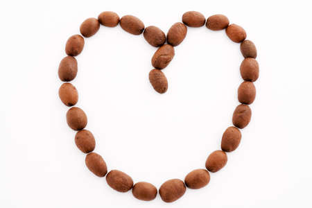 A Coffee heart isolated over white bachkroungの写真素材
