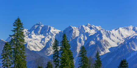 The landscape of Sochi Krasnaya Polyana, winter mountains, blue sky