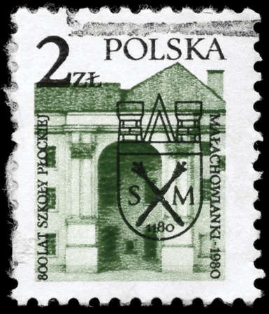 POLAND - CIRCA 1980: A Stamp printed in POLAND shows the image of a Malachowski Lyceum (oldest school in Plock), 800th anniversary, circa 1980の写真素材