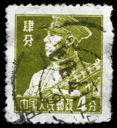 CHINA - CIRCA 1955: A Stamp printed in CHINA shows the portrait of a Soldier with tommy-gun, series, circa 1955の写真素材