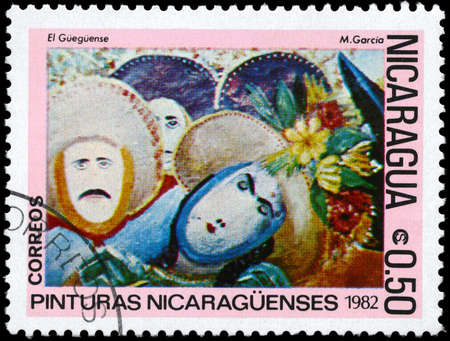 NICARAGUA - CIRCA 1982: A Stamp printed in NICARAGUA shows the painting "Masked Dancers" of the artist M.Garcia, from the series "Paintings", circa 1982の写真素材