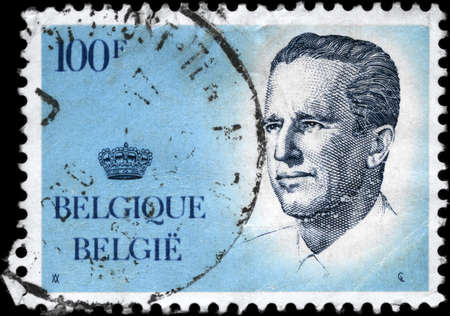 BELGIUM - CIRCA 1984: A Stamp printed in BELGIUM shows the portrait of a Baudouin I (1930-1993) reigned as King of the Belgians, series, circa 1984の写真素材