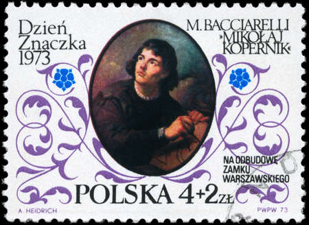 POLAND - CIRCA 1973: A Stamp printed in POLAND shows the portrait of a Copernicus, by Marcello Baciarelli, with the description "Stamp Day. The surtax was for the reconstruction of the Royal Castle in Warsaw", circa 1973の写真素材