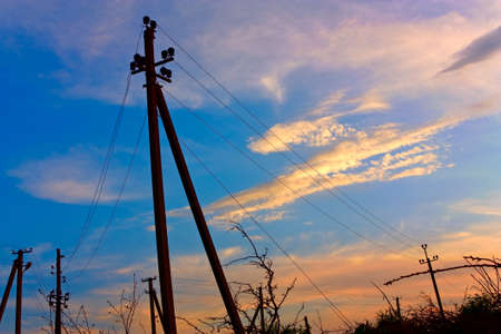 Electrical poles on a sky backgroundの写真素材
