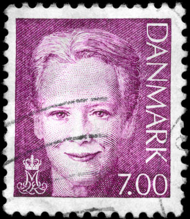 DENMARK - CIRCA 2000: A Stamp printed in DENMARK shows the portrait of a Queen Margrethe II (born 16 April 1940), series, circa 2000のeditorial素材