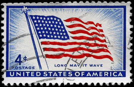 USA - CIRCA 1957: A Stamp printed in USA shows the Flag Old Glory (48 Stars), with the inscription Long may it wave, circa 1957の写真素材