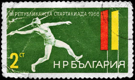 BULGARIA - CIRCA 1966: A Stamp printed in BULGARIA shows the Woman Javelin Thrower, from the series "3rd Spartacist Games", circa 1966の写真素材