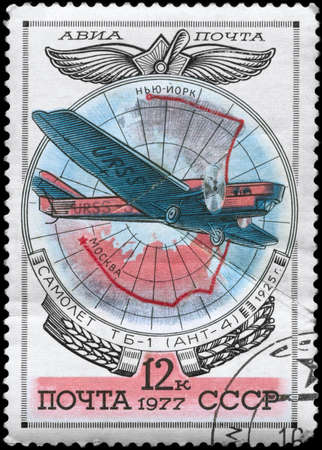 USSR - CIRCA 1977: A Stamp printed in USSR shows the Aviation Emblem and TB-1 (ANT-4) monoplane...