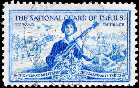 USA - CIRCA 1953: A Stamp printed in USA shows the National Guardsman and Amphibious Landing, circa 1953のeditorial素材