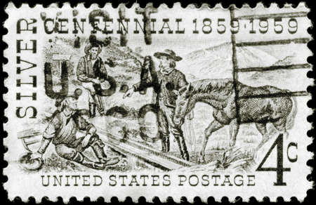 USA - CIRCA 1959: A Stamp printed in USA shows Henry Comstock at Mount Davidson Site, Silver Centennial Issue, circa 1959のeditorial素材