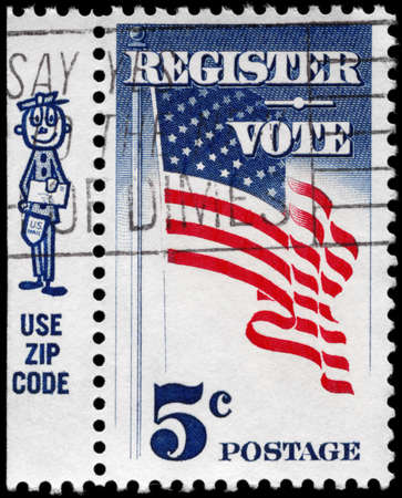 USA - CIRCA 1964: A Stamp printed in USA shows the U.S. Flag, with the inscription "Register Vote" and a cartoon mailman, circa 1964のeditorial素材