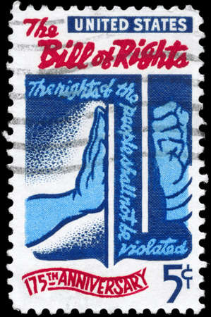USA - CIRCA 1966: A Stamp printed in USA shows the Freedom checking Tyranny, devoted to Bill of Rights, 175th Anniversary, circa 1966のeditorial素材