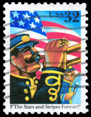 USA - CIRCA 1997: A Stamp printed in USA shows the US Flag and Trumpeter, with the inscription "The Stars and Stripes Forever!", circa 1997のeditorial素材