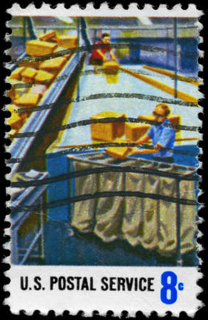 USA - CIRCA 1973: A Stamp printed in USA shows the Parcel Post Sorting, Postal Service Employees...