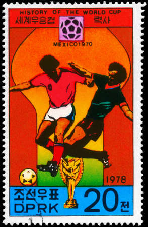 NORTH KOREA - CIRCA 1978: A Stamp printed in NORTH KOREA shows the Soccer players and championship emblem, Mexico 1970, History of the
World Cup, circa 1978のeditorial素材