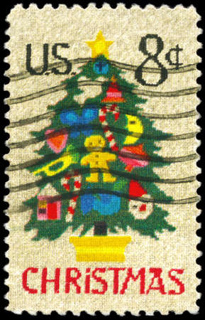 USA - CIRCA 1973: A Stamp printed in USA shows the Christmas Tree in Needlepoint, circa 1973の写真素材