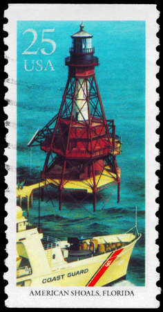 USA - CIRCA 1990: A Stamp printed in USA shows American Shoals, Florida, Lighthouses series, circa 1990の写真素材