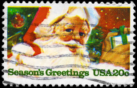 USA - CIRCA 1983: A Stamp printed in USA shows a Santa Claus with the description ,Seasons Greetings, Christmas issue, circa 1983の写真素材